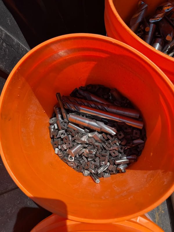 Machine shop cleanout with carbide inserts, drills and cutters.